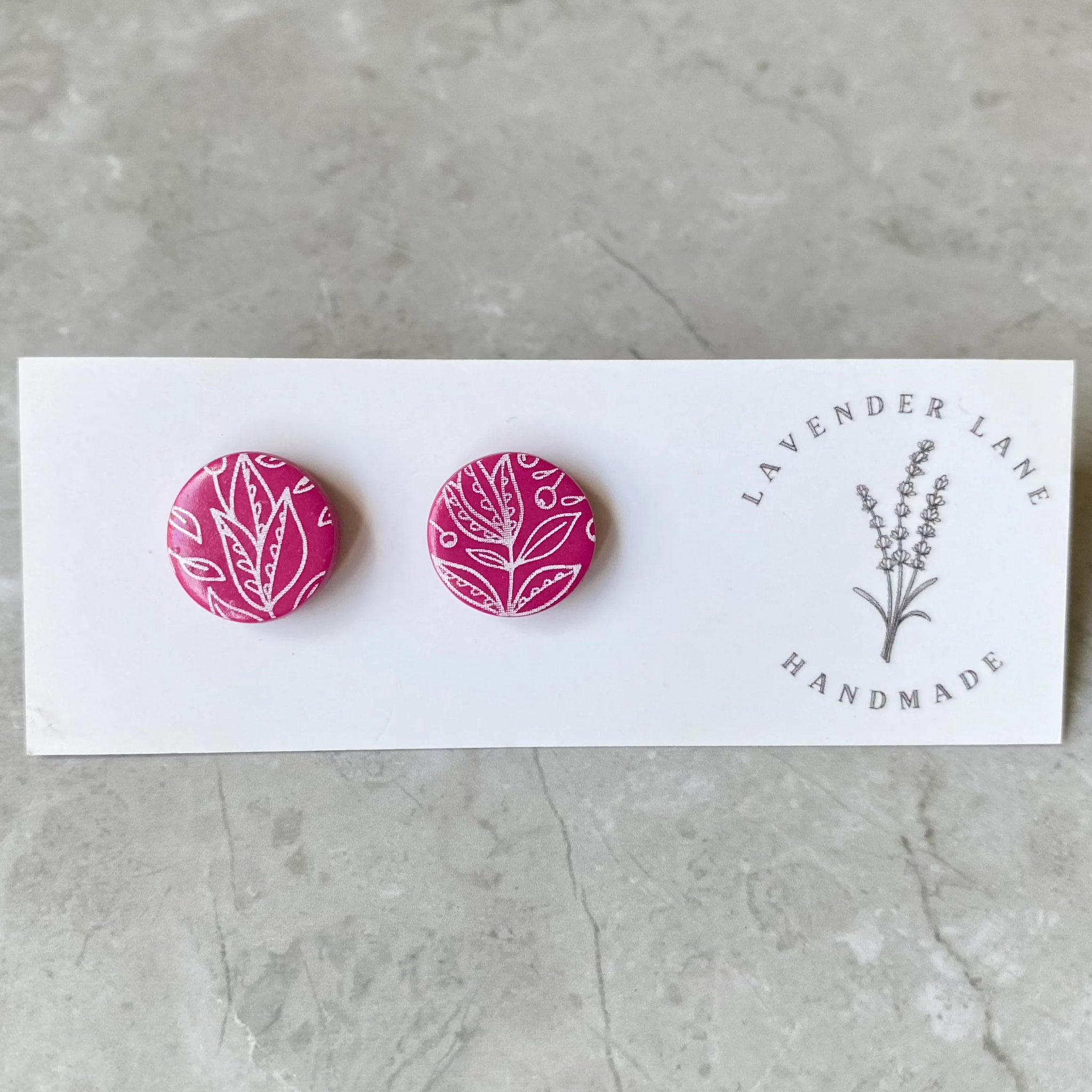 Ruby leaf print studs