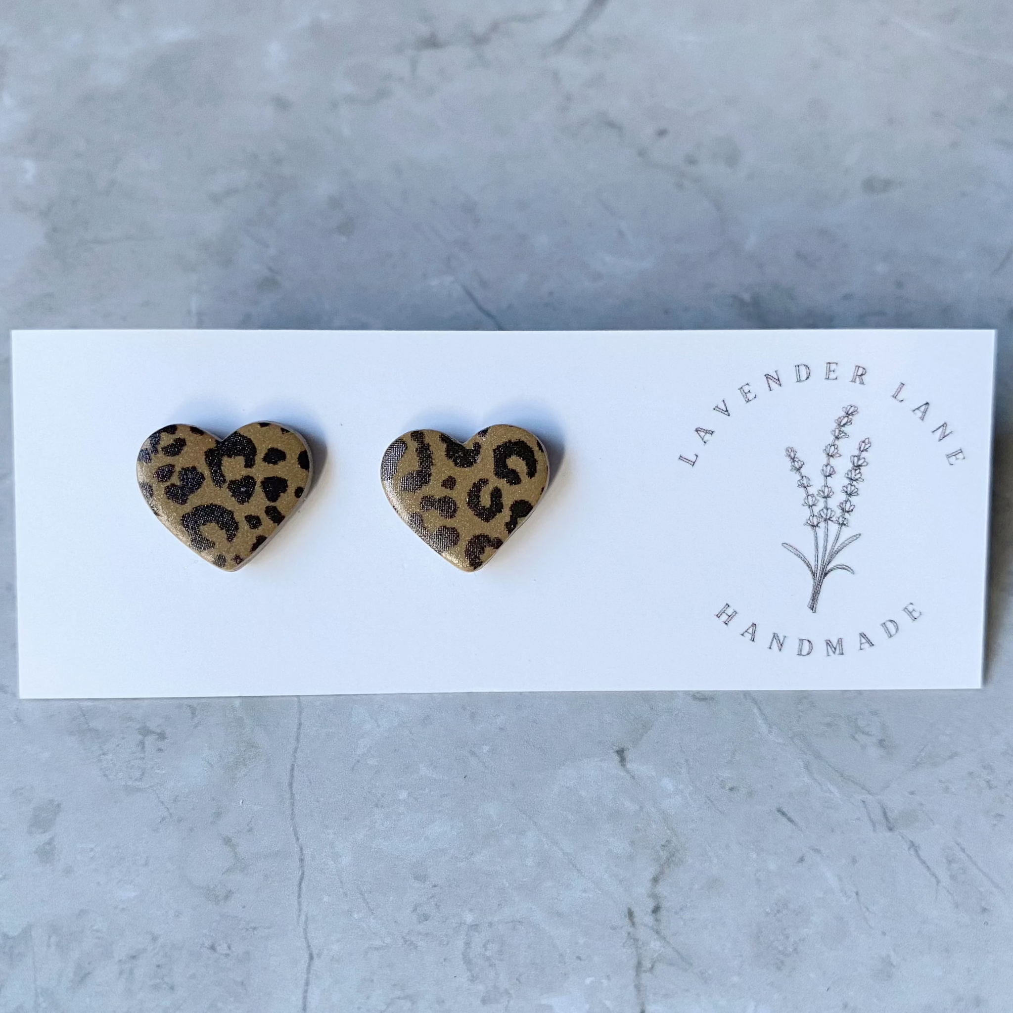 Jenna leopard heart studs