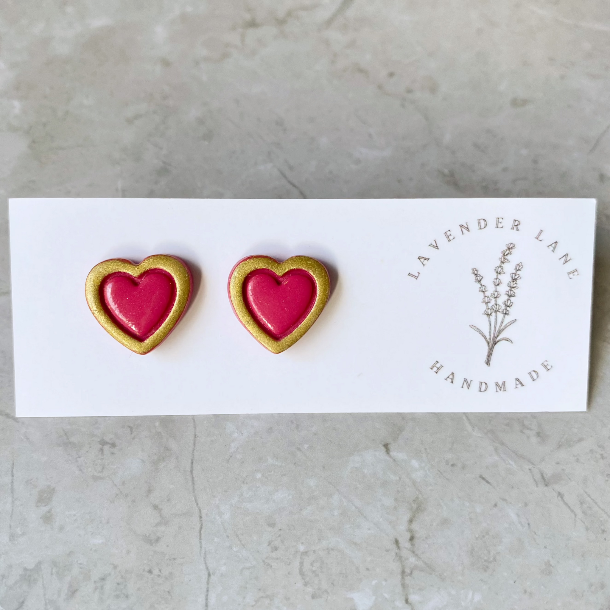 Rosa gold outline heart studs