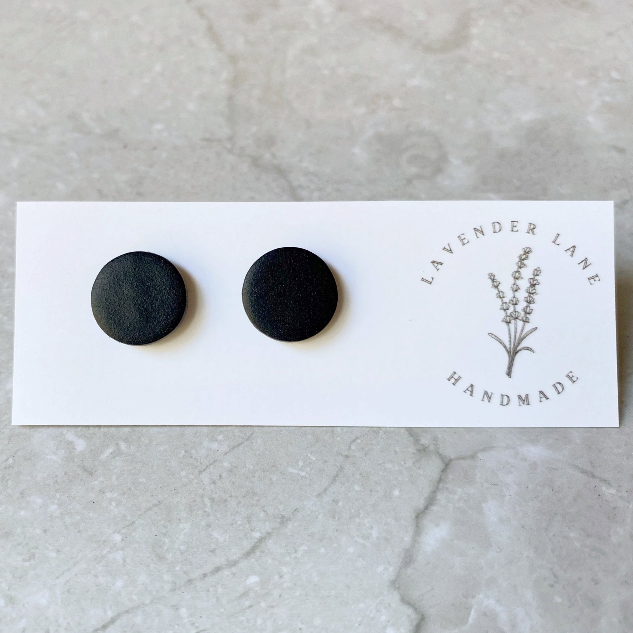 Ruth black round studs