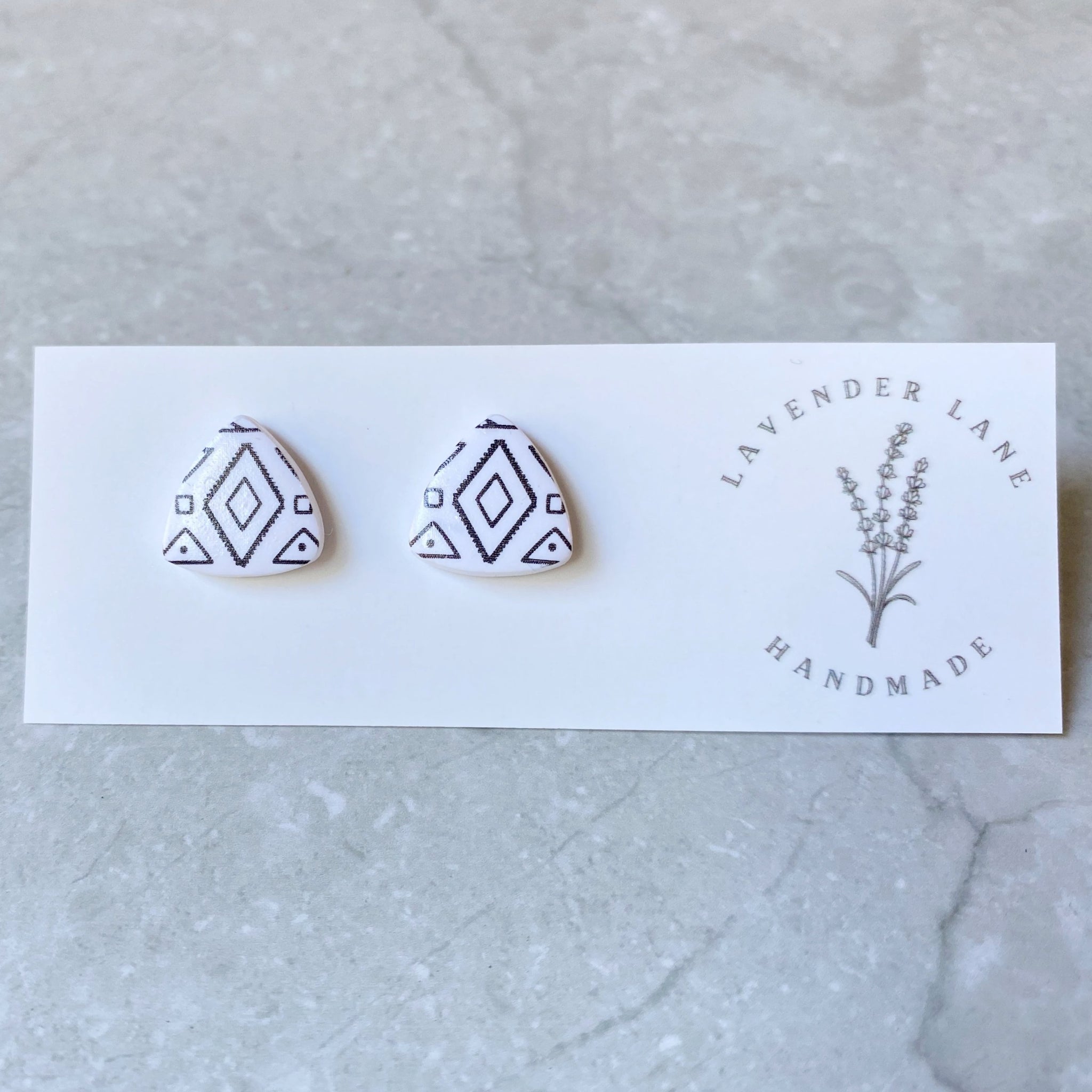 Zara aztec print triangle studs