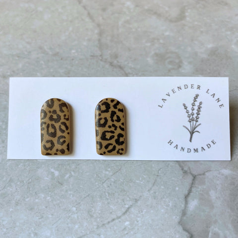 Jenna leopard arch studs