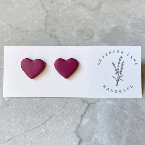 Maggie raspberry heart studs