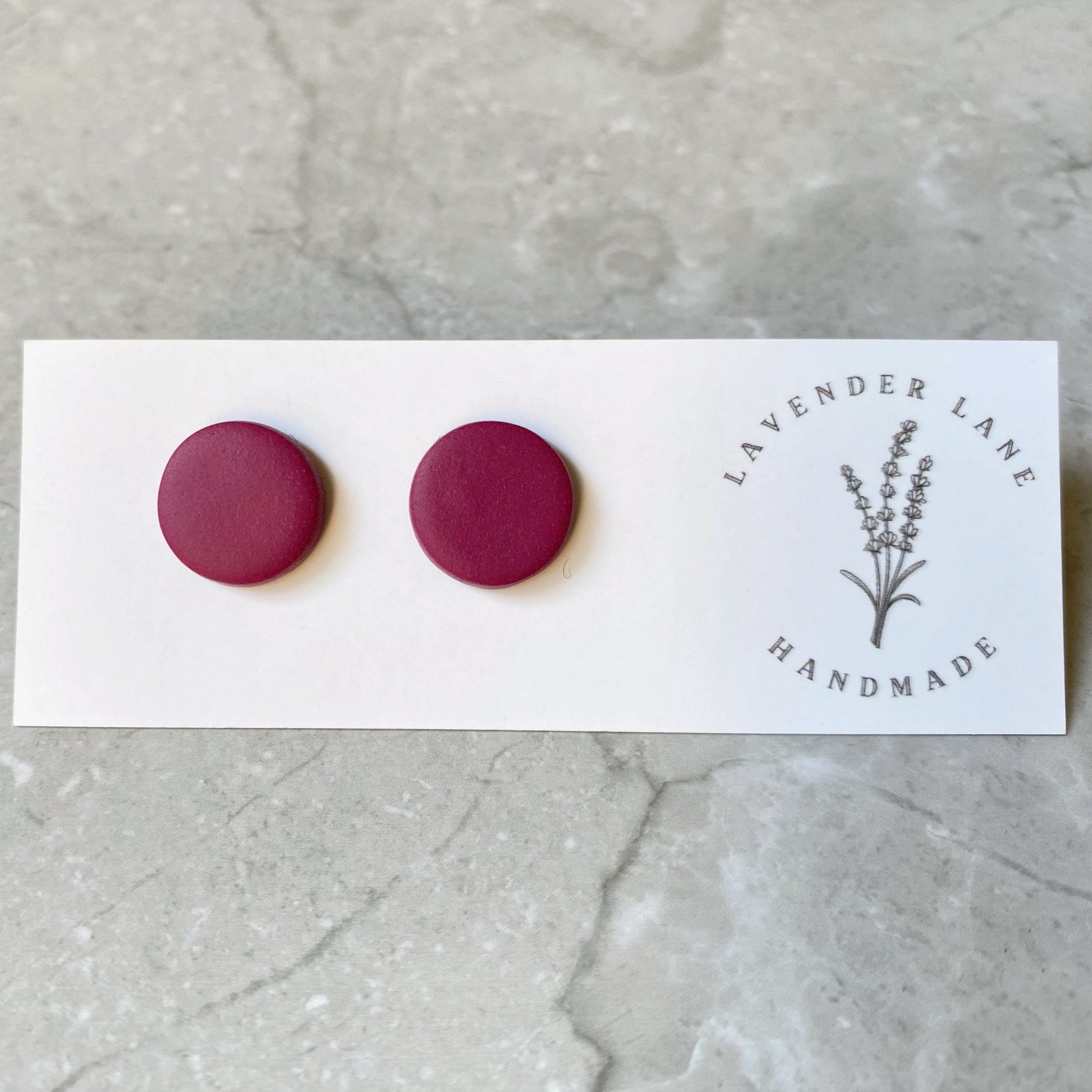 Maggie raspberry round studs