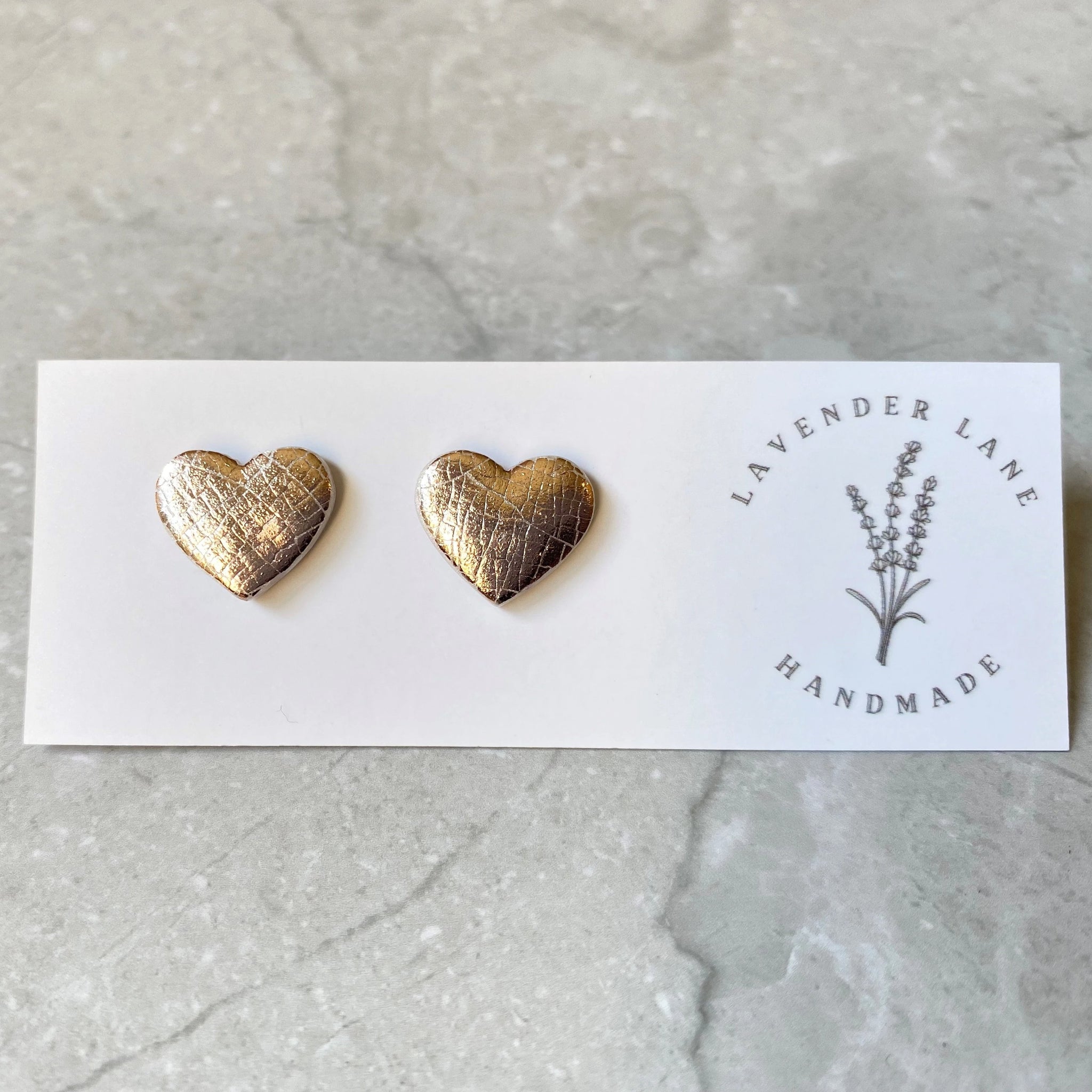 Kiara metallic rose gold heart studs